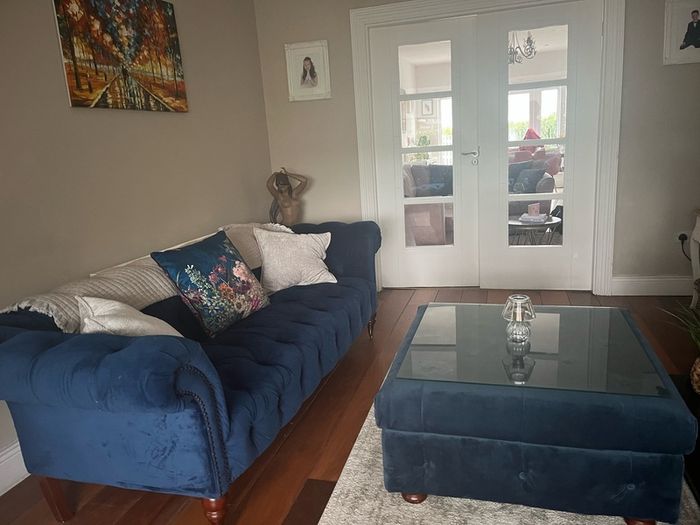 3 & 2 seater navy velvet chesterfield style couches with matching footstool with removable glass top