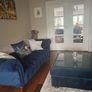 3 & 2 seater navy velvet chesterfield style couches with matching footstool with removable glass top Image 2
