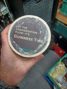 Guinness beer mats