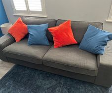 Large sofa in good condition dark grey.