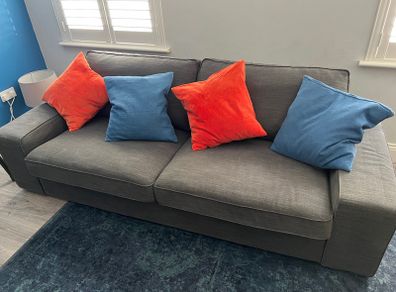 Large sofa in good condition dark grey.