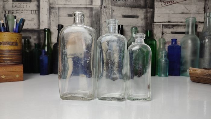 330 - Set of 3 Vintage Clear Glass Collectible Decorative Bottles