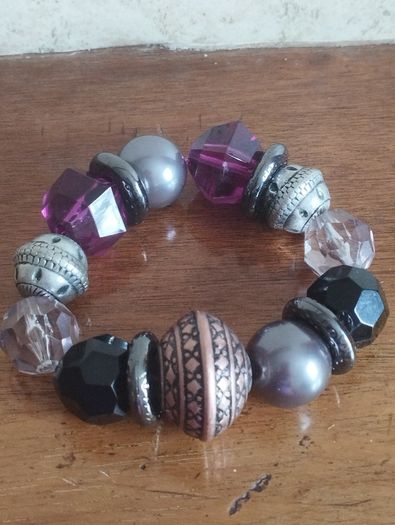 Vintage bracelet with purple beads.
