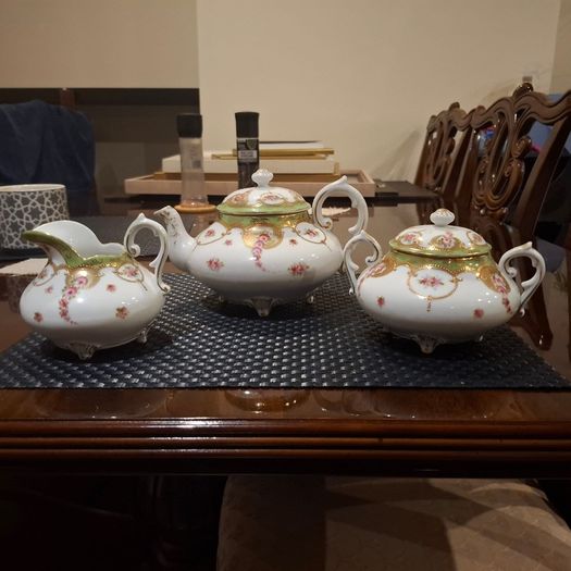 Antique tea pot sugar bowl and milk jug