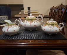 Antique tea pot sugar bowl and milk jug