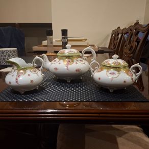 Antique tea pot sugar bowl and milk jug