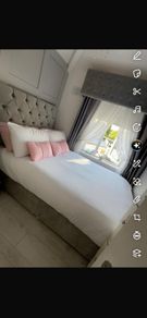 Bed and pelmet