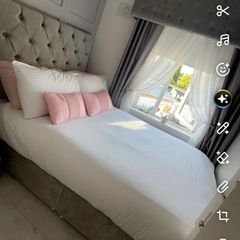 Bed and pelmet
