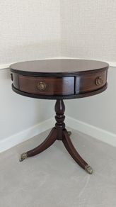 Circular pedestal side table with drawers