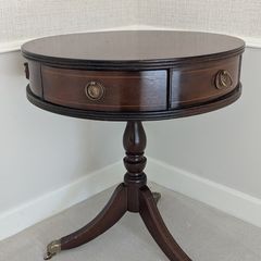 Circular pedestal side table with drawers