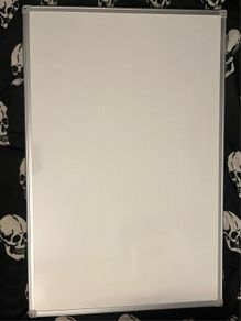 Non-magnetic whiteboard for use with drywipe markers