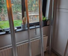 Bi-fold shower door