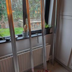 Bi-fold shower door