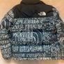 The North Face 700 Puffer Jacket in the "Black Logo Print" colorway Image 5