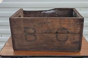 Old beer bottle crate stamped "B C" and "4  69"