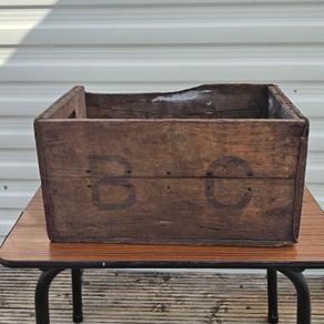 Old beer bottle crate stamped "B C" and "4  69"