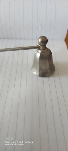 Candle metal snuffer ,,good patina for its age ,sold as seen
