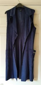 New blue sleeveless women's jacket (boutique bought)