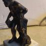 Bronze-style patina and mounted on a white marble basefigurine of the ancient Greek philosopher Diogenes of Sinope, often depicted with his lantern and a dog. Image 3