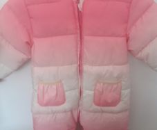 New baby snowsuit .No tags but never worn with fleece lining .A generous size 0-3months