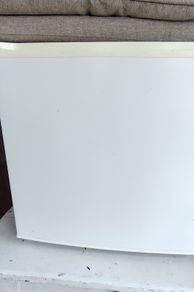 small tabletop fridge in working order. In excellent condition. Small ice box. Perfect for keeping milk and lunch cool in office