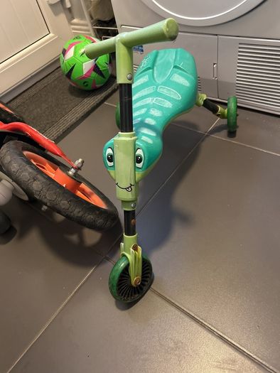 Two toddler bikes and a balance bike