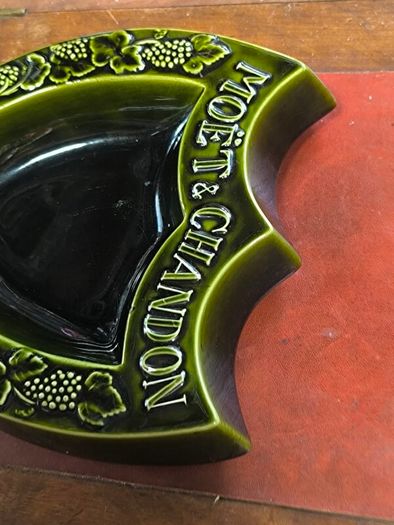 vintage Moet & Chandon shield-shaped ceramic advertising piece.
