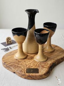 Irish glazed pottery wine jug and glasses