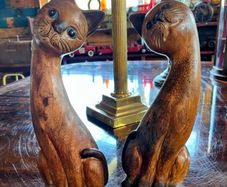 Pair of tall vintage wooden carved figurines