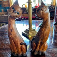 Pair of tall vintage wooden carved figurines