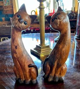 Pair of tall vintage wooden carved figurines