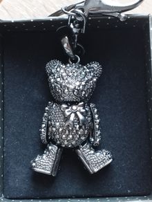 A fashionable, luxurious teddy bear keychain with marcasites.