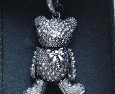 A fashionable, luxurious teddy bear keychain with marcasites.
