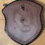 Vintage Spanish-made wall plaque featuring a decorative coat of arms. Image 3