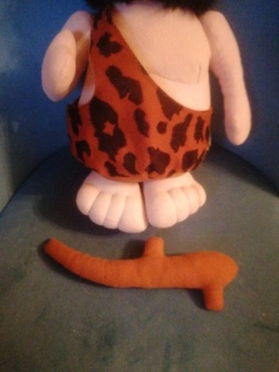 vintage caveman plush toy