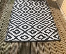 Two patio rugs