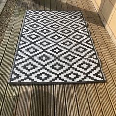 Two patio rugs