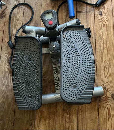 rowing machine, ab roller & stepper