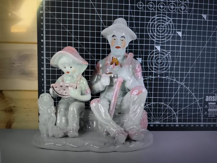 Vintage Porcelain Man with a Girl Eating WaterMelon God Log