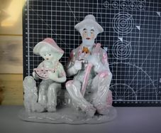 Vintage Porcelain Man with a Girl Eating WaterMelon God Log