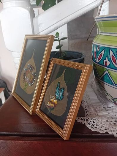 A pair of Vintage handpainted Peepal Leaf Paintings
