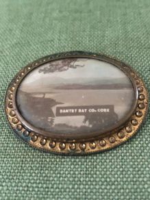 antique brooch framed photo cork