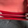 Michael Kors red and pink wallet with gold-tone MK logo. Multiple card slots and a zipped coin compartment. In perfect condition apart from some minor wear inside, which is not noticeable when using it, as shown in the photos. Image 9