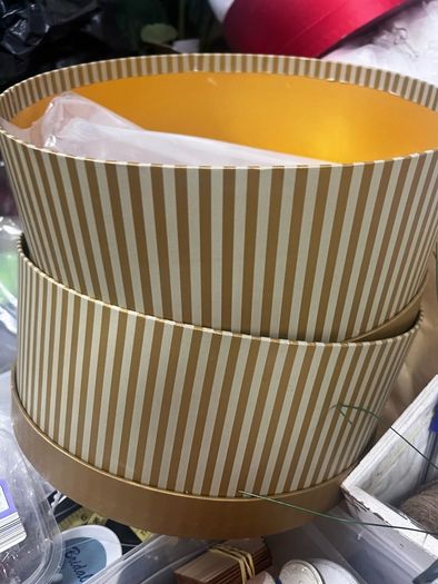 Hat boxes round two sizes. 3 colours