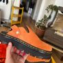 Dr Martens boots-  zebzag mules in orange Image 2