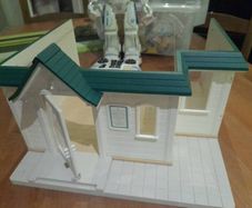 sylvanian Dr surgery and dolls.