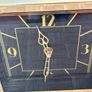 Gold clock with black face Image 6