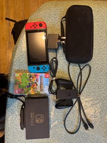 Nintendo Switch console with Minecraft game and travel case