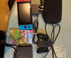 Nintendo Switch console with Minecraft game and travel case