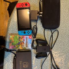 Nintendo Switch console with Minecraft game and travel case